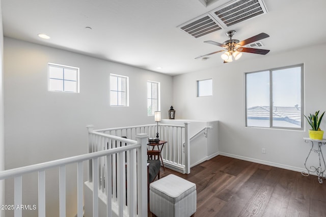 31332 N 137th Ln, Peoria, AZ 85383 - hall with an upstairs landing, wood finished floors, healthy amount of natural light, and recessed lighting