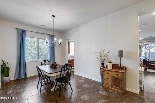 31332 N 137th Ln, Peoria, AZ 85383 - dining room featuring a chandelier and baseboards
