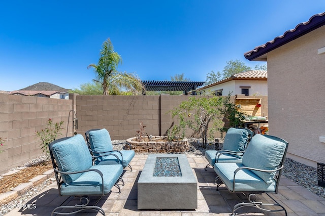 31332 N 137th Ln, Peoria, AZ 85383 - fenced backyard featuring an outdoor fire pit and a patio