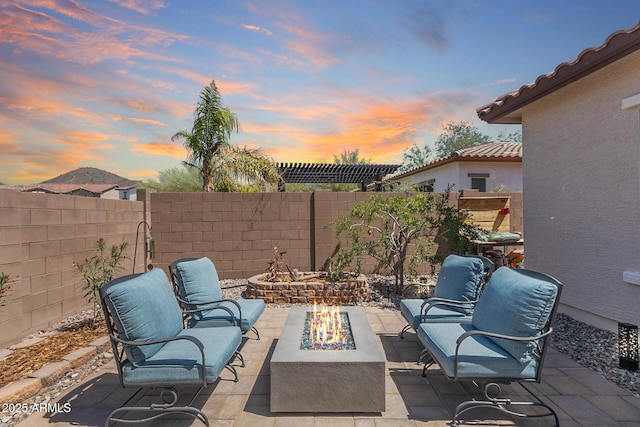 31332 N 137th Ln, Peoria, AZ 85383 - fenced backyard with a fire pit and a patio