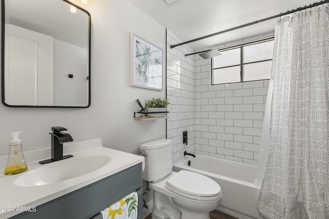 full bathroom with shower / bath combo, vanity, and toilet