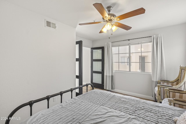 bedroom featuring ceiling fan