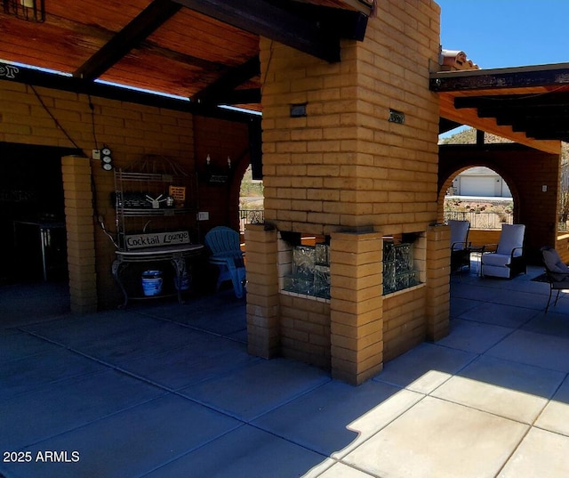 9607 E Mckellips Rd, Mesa, AZ 85207 - view of patio featuring a fireplace