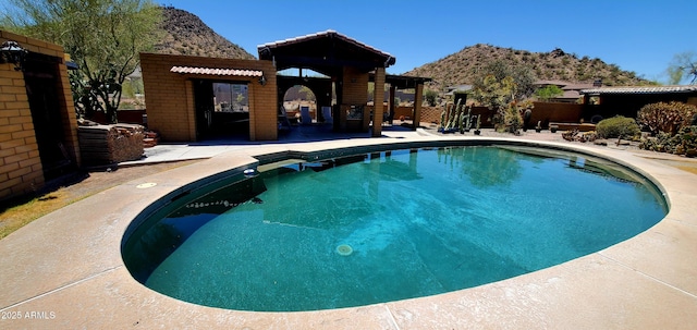 9607 E Mckellips Rd, Mesa, AZ 85207 - outdoor pool with a mountain view and a patio area