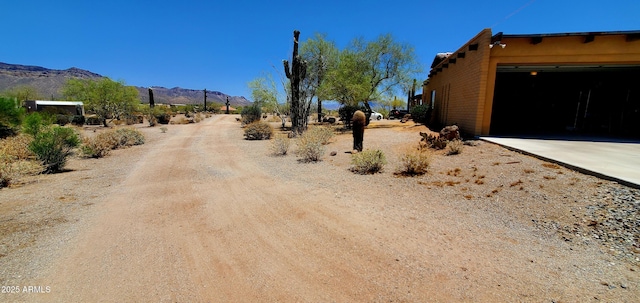 9607 E Mckellips Rd, Mesa, AZ 85207 - view of dirt / gravel road with a mountain view