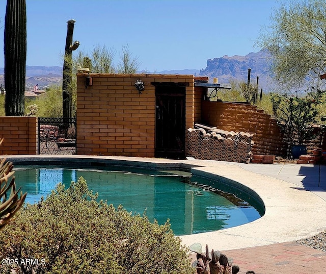 9607 E Mckellips Rd, Mesa, AZ 85207 - view of swimming pool with a mountain view