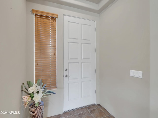 interior space featuring light tile patterned floors