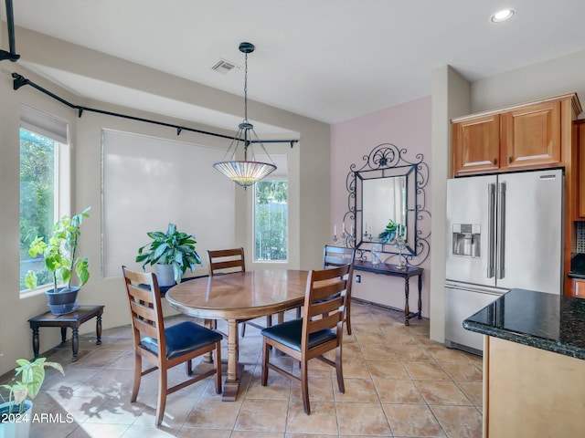 view of tiled dining space