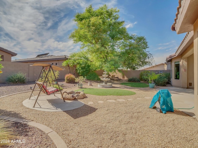 view of yard with a patio area