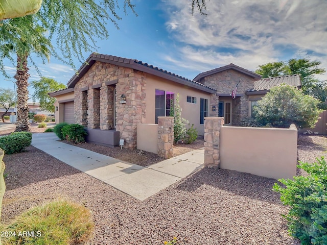 view of front of home with a garage