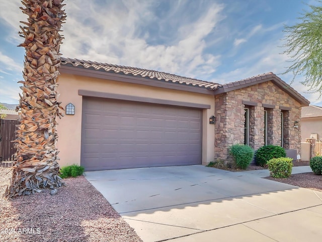 view of front of property featuring a garage