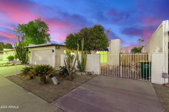 view of front of home with a garage