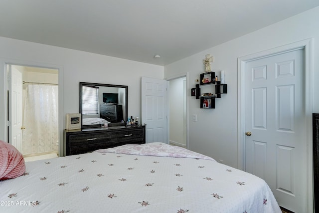 bedroom featuring ensuite bathroom