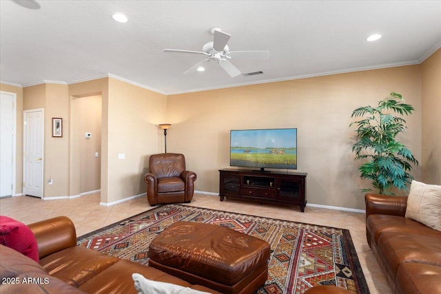 living room with ceiling fan, light tile patterned flooring, and ornamental molding