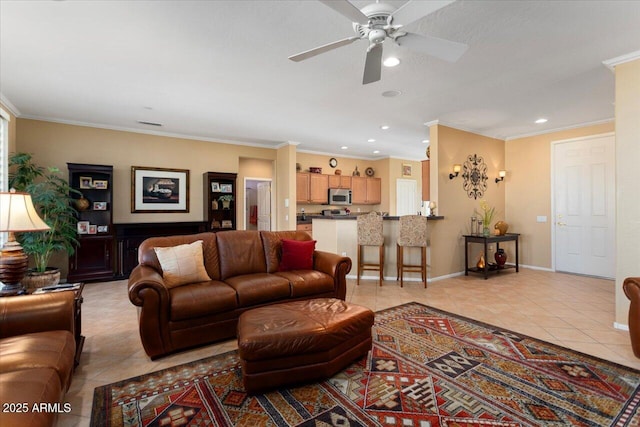 tiled living room featuring ceiling fan and ornamental molding