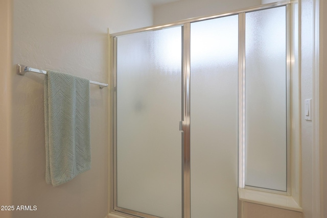 bathroom with an enclosed shower