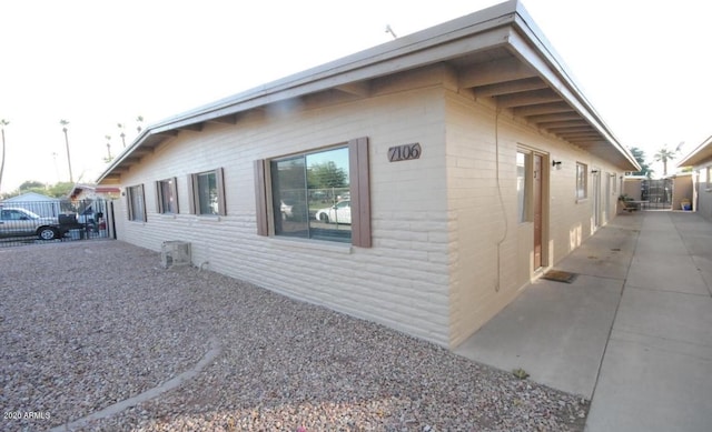 view of property exterior featuring a patio