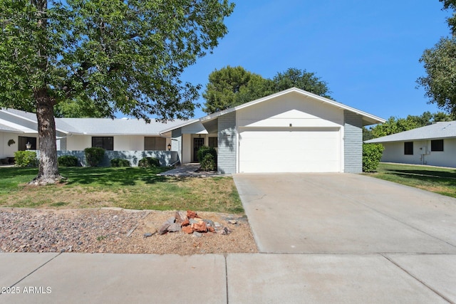 ranch-style home featuring a garage, a front lawn, and driveway