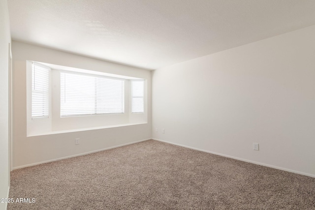 925 S Longmore Unit 201, Mesa, AZ 85202 - carpeted empty room with baseboards