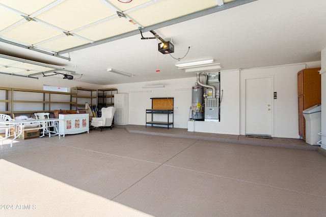 garage featuring a garage door opener, gas water heater, and heating unit