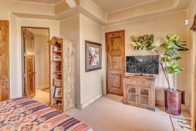 bedroom featuring light colored carpet