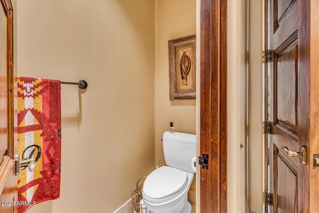 bathroom featuring toilet