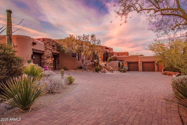 adobe home with a garage