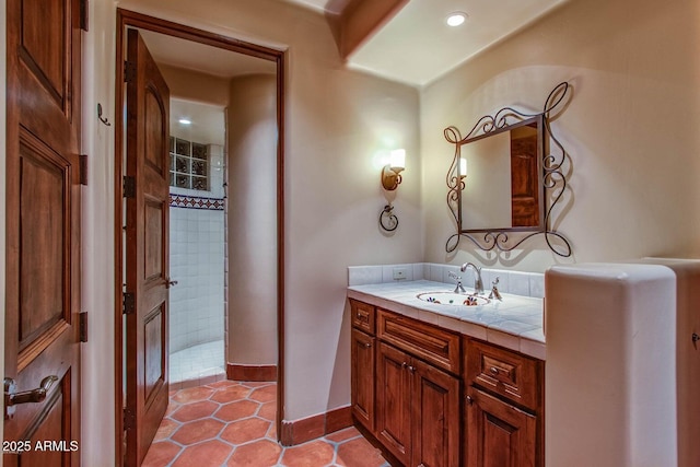 bathroom with vanity and tile patterned floors