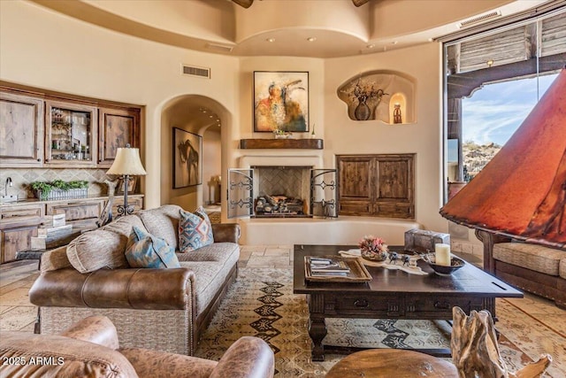 living room with a towering ceiling