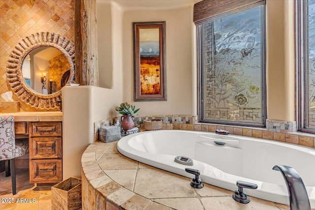 bathroom with tiled bath