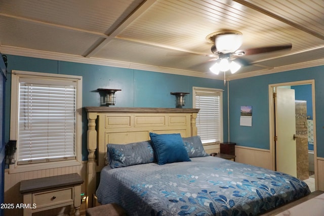 1034 S 3rd St, Coolidge, AZ 85128 - bedroom with ornamental molding, wainscoting, a decorative wall, and a ceiling fan