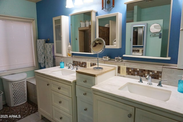 1034 S 3rd St, Coolidge, AZ 85128 - bathroom with vanity, tasteful backsplash, and tile patterned floors