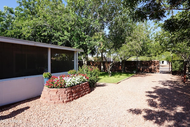 1034 S 3rd St, Coolidge, AZ 85128 - view of yard featuring a sunroom