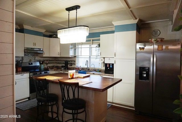 1034 S 3rd St, Coolidge, AZ 85128 - kitchen with appliances with stainless steel finishes, butcher block countertops, under cabinet range hood, white cabinets, and crown molding