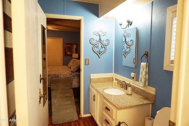 1034 S 3rd St, Coolidge, AZ 85128 - bathroom featuring vanity and wood finished floors