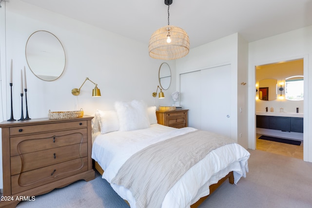 carpeted bedroom with a closet