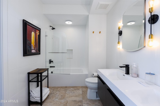 7120 E Kierland Blvd Unit 416, Scottsdale, AZ 85254 - full bathroom featuring toilet, vanity, shower / bathtub combination, and stone finish flooring