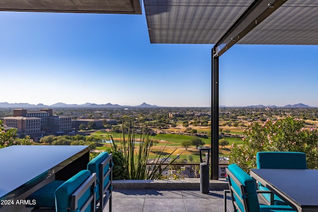 balcony featuring a mountain view