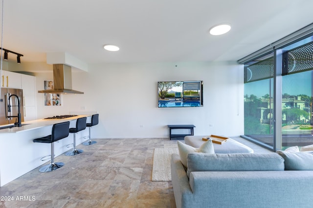 7120 E Kierland Blvd Unit 416, Scottsdale, AZ 85254 - living room featuring stone finish floors