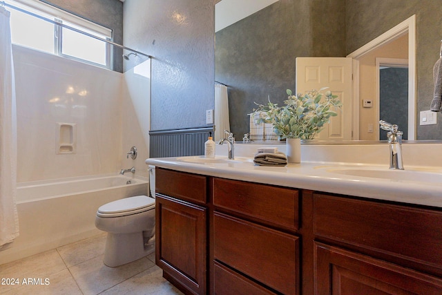 full bathroom with toilet, vanity, tile patterned floors, and shower / bathtub combination