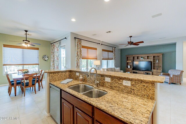 living room with light tile patterned floors and ceiling fan