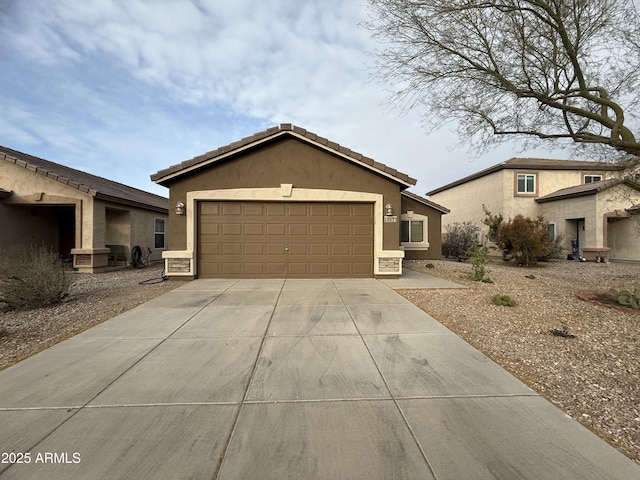 ranch-style house featuring a garage