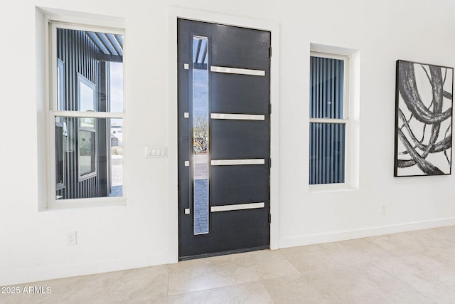 707 E Ocotillo Rd, Phoenix, AZ 85014 - foyer featuring baseboards and tile patterned floors