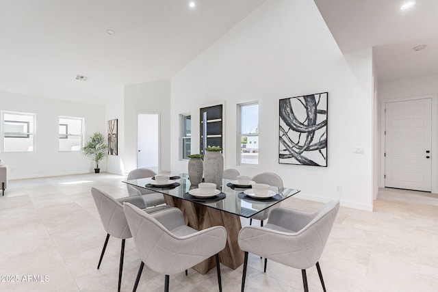 707 E Ocotillo Rd, Phoenix, AZ 85014 - dining area with recessed lighting, baseboards, high vaulted ceiling, and light tile patterned flooring