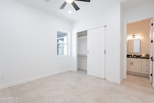 707 E Ocotillo Rd, Phoenix, AZ 85014 - unfurnished bedroom with a closet, recessed lighting, baseboards, a ceiling fan, and ensuite bathroom