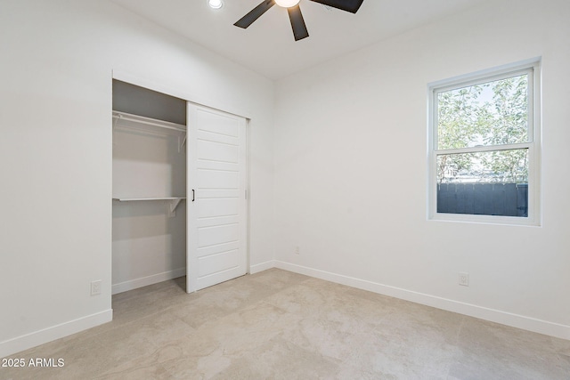 707 E Ocotillo Rd, Phoenix, AZ 85014 - unfurnished bedroom with baseboards, a closet, a ceiling fan, and carpet