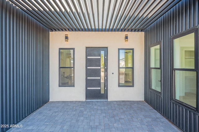 707 E Ocotillo Rd, Phoenix, AZ 85014 - entrance to property with a patio area and stucco siding
