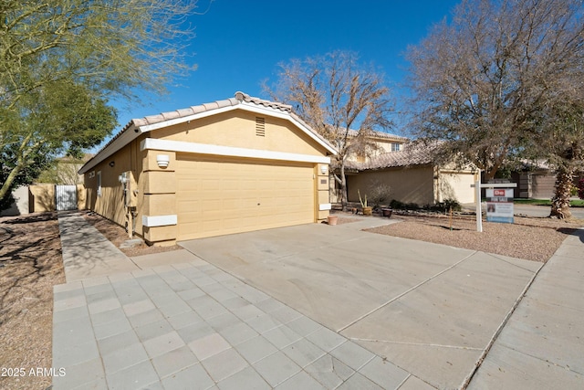 single story home featuring a garage