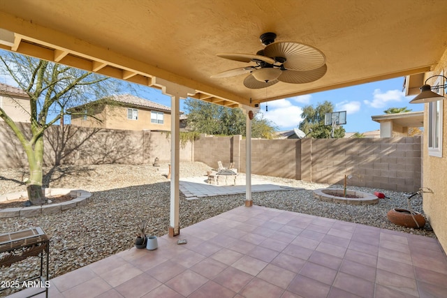 view of patio / terrace featuring ceiling fan