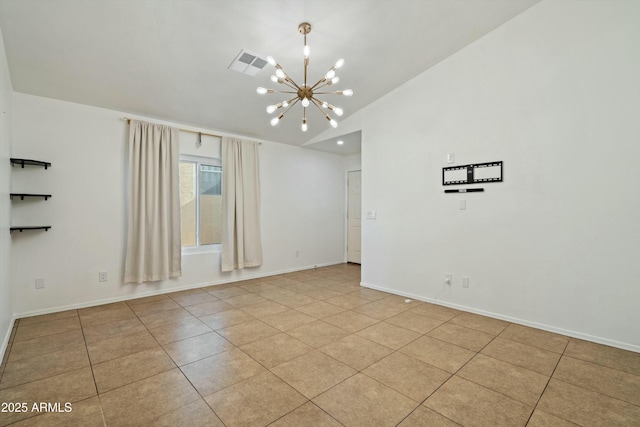 empty room with lofted ceiling, a chandelier, and light tile patterned floors